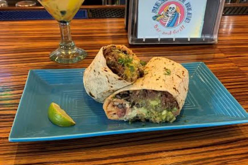 The village of Wappingers Falls, New York (population 5,500), is home to Mexicali Blue — and its mouthwatering short-rib burrito. Not only is the meat house-butchered, but the ribs are cooked in Modelo Negra beer with fragrant herbs and spices for 7 to 8 hours. Accompanying the meat are rice, beans, guacamole, pico de gallo, a special coleslaw and an exclusive hot sauce that lends the dish a unique flavor. Everything is made fresh and in-house, for a burrito that's truly is a bite to remember.