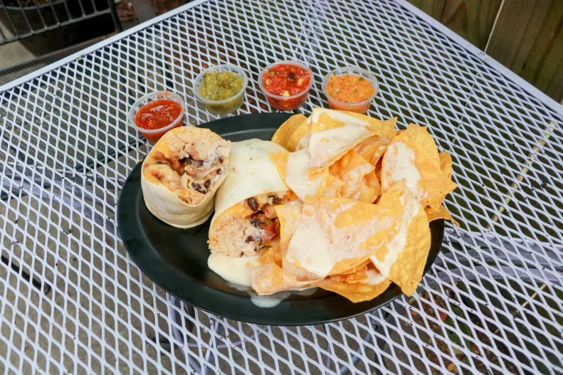 Chances are if you bring up Wilmington, North Carolina, Flaming Amy's Burrito Barn will come up in conversation. The spicy Flaming Amy burrito is one of the most popular and is filled with chipotles, fresh jalapenos, green chiles, lettuce, cheese, sour cream, rice and beans. Burritos are obviously the standout here, but it's the fresh salsa bar that draws customers in time and time again. It offers nine salsa choices, including traditional tomato, black bean and corn, flaming hot, Asian cucumber, wasabi avocado, green tomatillo, chipotle tomatillo, ginger peach and pineapple jalapeno.