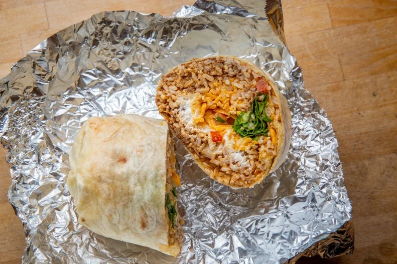A staple in Athens, Ohio, Big Mamma's Burritos serves up a burrito so large that the owners claim they've taken the standard burrito and corrupted it with delicious, twisted ideas. The Chili Mamma, a soft flour tortilla stuffed with rice, hot sauce, sour cream, cheddar cheese, lettuce, tomatoes, onions and famous Skyline chili, is a hot commodity, but the Chipotle Ranch Mamma is the most-popular burrito. Think chicken, a delicious chipotle ranch sauce, cheese, rice, lettuce, tomatoes and onions. Whatever you choose, you won't leave hungry.