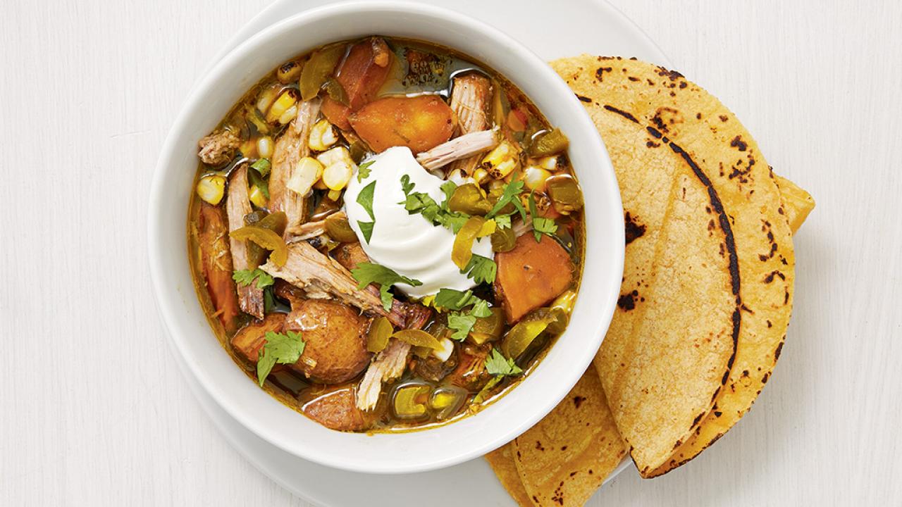 https://food.fnr.sndimg.com/content/dam/images/food/fullset/2019/10/4/0/FNM_110119-Slow-Cooker-Pork-and-Green-Chile-Stew_s4x3.jpg.rend.hgtvcom.1280.720.suffix/1570214930368.jpeg