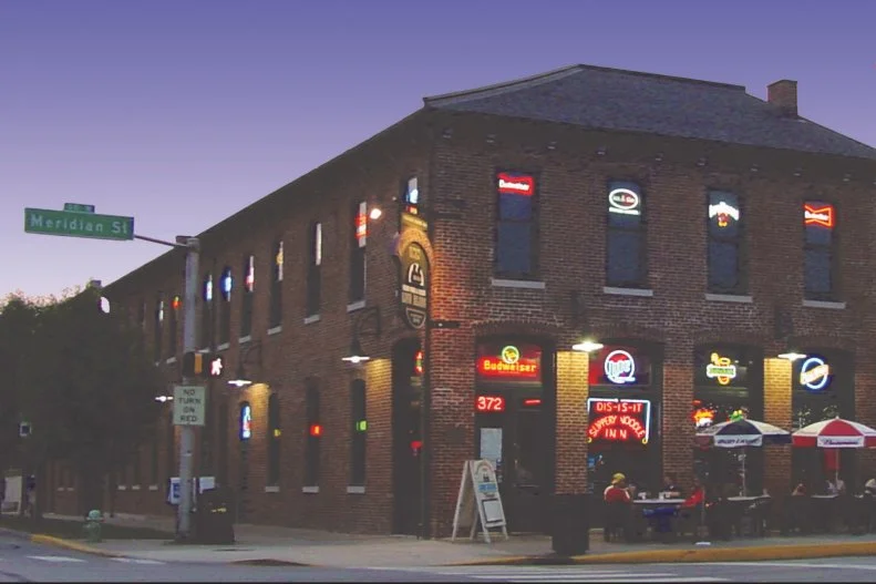 Established in 1850, the Slippery Noodle Inn is Indiana’s oldest bar and remains an Indianapolis institution, known for both its live music and history. It was first a traveler’s inn called Tremont House; individual rooms on the second floor were rented to travelers before becoming part of a working brothel. The basement has rooms that were used by the Underground Railroad, and some that contained Prohibition-era stills. With such a storied past, it’s no wonder that the Noodle has attracted the attention of psychics and paranormal groups. Many have investigated the bar and identified ghosts, including the Madam who ran the upstairs brothel (aka “the woman in red”), and Sarah, one of the working girls (aka “the woman in blue”) who was purportedly killed here by one of her clients. Another figure who’s frequently spotted is an older man named George, who was purportedly the Inn’s handy man. He spooked a beer delivery driver so badly that the driver requested a different route. You might be just as likely to see a celebrity here — Peyton Manning, Jimmy Fallon and Robert DeNiro have all stopped by. But you can always count on signature dishes such as the jumbo tenderloin, a breaded, deep-fried pork cutlet that’s a Hoosier State specialty.