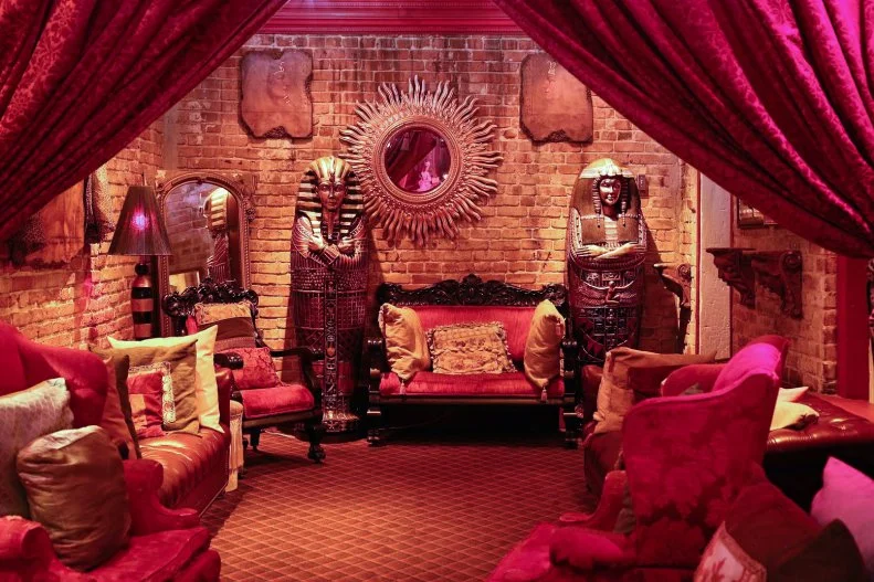 When Muriel’s opened in 2001 in New Orleans’ French Quarter, its mission was to be more than just a restaurant. Co-owner Denise Gratia says they wanted it to be a venue that excites all the senses, and the restaurant has since lived up to its name with some hair-raising happenings. Book the Ghost Table, which is set each night with bread and wine to appease the spirit of its resident ghost, Pierre Antoine Lepardi Jourdan, who just might join you for supper. The spooky vibes continue upstairs — in the back corner is the Séance Lounge which is mysteriously chillier than the rest of the place. Many diners have experienced such bizarre paranormal activity here that they’ve emailed or messaged photos of ethereal images to the owners. Regulars and employees alike have witnessed glasses falling off the shelves when no one is around and wine bottles inexplicably falling out of their storage bins. But it’s not just about the ghosts at Muriel’s. Seriously good eats include the fan-favorite crêpes, stuffed with goat cheese and topped with a creamy crawfish sauce, or the wood-grilled double-cut pork chop, served with a duo of Southern sides including pecan sweet potatoes and greens. If you’re dining in October, wash it all down with the Vampire’s Kiss, where lemon vodka mingles with a cranberry-balsamic reduction that gives it just the right bite.