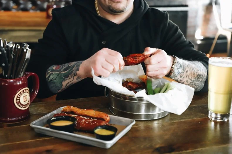 Since it opened in 2016, Brick & Ash has quickly earned legions of fans among Newburyport locals for its creative bar food, live music and games. But Lucinda was here long before any of that fanfare. Rumor has it that back when the building was a brothel, she was pushed down a flight of stairs to her death. She has haunted the place since at least the 1970s, when the building housed a restaurant called Ten Center. Its employees still recall experiencing glasses randomly shattering and temperatures drastically dropping in certain parts of the building. Brick & Ash's bar manager, Shaun O’Connor, has reported getting the chills inexplicably, seeing lights flickering and dimming on their own and hearing footsteps on the infamous stairway. Despite these eerie escapades, Brick & Ash maintains a warm, family-friendly pub atmosphere with an inviting courtyard patio and an upstairs game area outfitted with shuffleboards, dart boards and pool tables. From the menu, don’t miss shareable appetizers like soft pretzels with beer cheese or the smoked chicken wings. Raise a glass and toast the lady of the house with The Lucinda, a bracing riff on a gin-and-tonic punctuated with fresh lime and basil.
