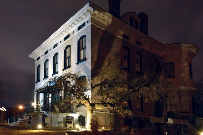 The Lemp Mansion in St. Louis is a popular lunch spot as well as a dinner destination, when it exudes its full Victorian charm and classic soiree feel. But the mansion’s dark side is a well-known phenomenon among St. Louis locals and ghost hunters alike. Paranormal investigators have reported disembodied voices, sightings of otherworldly figures and EVP (Electronic Voice Phenomena) recordings of all kinds. The origins of the activity are unknown, but many speculate that a series of Lemp family tragedies might have something to do with it. Visitors have also reported feeling overcome with uneasiness and melancholy and discovering unexpected figures, orbs and shadows in photographs that weren’t present at the time they were taken. Despite all this, the Lemp Mansion remains a beloved St. Louis treasure and dining spot. Several dishes on the menu are named for Lemp family members. Try the Steak Charles, (named for Charles Lemp), which rolled in Italian breadcrumbs is topped with the city’s beloved Provel cheese, mushrooms and a white wine-lemon butter sauce. Wash it down with a Lavender Lady Martini, a blueberry vodka and black raspberry liqueur number named for Lillian Lemp, the first wife of William “Billy” Lemp Jr., who gave her the nickname due to her penchant for wearing purple.