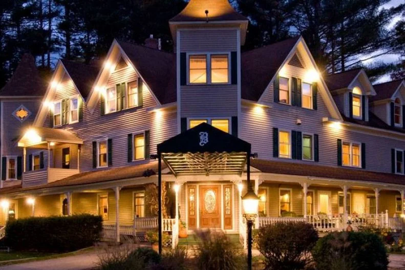 In the town of Glen, in the heart of New Hampshire’s White Mountains, lies the The Bernerhof Inn. The charming three-story Victorian inn was a stopover point for horse-drawn carriages en route to Crawford Notch in the late 1800’s and early 1900s. In 1955, Claire and Charlie Zumstein, who were part of a Swiss musical troupe, took over the inn. The dining room’s menu melded American and Swiss cuisine, and Claire and Charlie were known to play accordion and Alpine horn tableside, making it a popular date night spot. Claire passed away in the dining room (now the inn’s room 2) and it’s said that her spirit haunts the inn. She’s been spotted straightening curtains and folding laundry, and though owner Nick Panno says he hasn’t seen her, he has felt her presence. To pay homage to the Zumsteins, Swiss signatures such as wiener schnitzel and fondue will soon make a comeback to the menu. In the meantime, you can count on hearty breakfast signatures such as eggs benedict over asparagus.