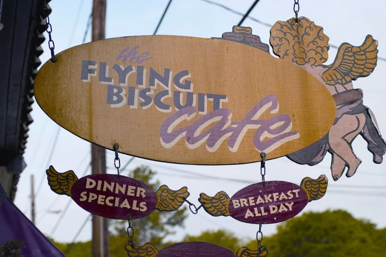 When the original location opened early one morning in 1993, the owners hoped to develop a following among their Candler Park neighbors. They knew they were onto something special when all of their dreamy biscuits were gone before the morning was over. Since then, the brand has grown to include more than 15 locations across the South, and the biscuits are still the star attraction. The comfort-food-centric menu offers breakfast all day and includes favorites like fried green tomatoes, crab cake Benedict and grilled flat iron steak and eggs. For the simplest pleasure, slather a still-steaming biscuit with the house specialty: cranberry apple butter.