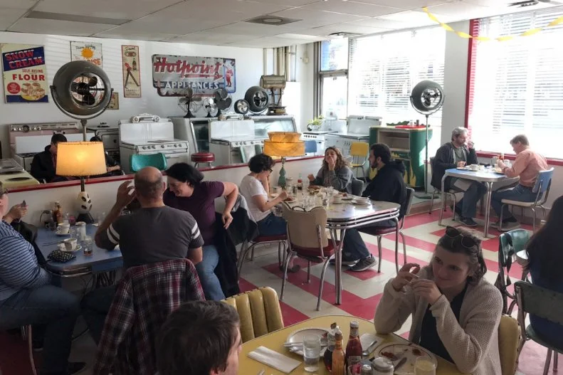 Breakfast or brunch at this retro diner on Ponce de Leon Avenue is a journey back to the 1950s. Formica tables and a collection of vintage toasters, percolators and Technicolor clocks keep the kitschy vibe strong, though what keeps crowds coming back is the undeniably delicious staples like fluffy pancakes and biscuits, rich coffee, Santa Fe egg scramble with chorizo, and cheesy cheddar grits. This no-frills eatery has been delighting guests since 1994.