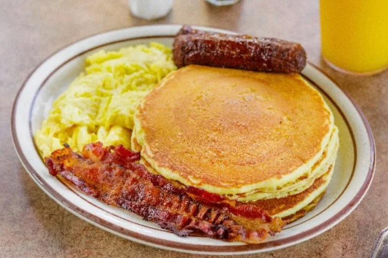 Since 1979, Peter Pan Diner has been fueling Fort Lauderdale locals and tourists with breakfast at any time of day. In fact, the breakfast offerings here are so popular that the diner goes through more than 1,000 dozen eggs every week. The prices hark back to another era too: Opt for the #4 and you'll get two pancakes, two eggs and two bacon strips for $4.50. If you've got a heartier appetite, get the Paulie Slam, which comes with three eggs, three pancakes, sausage and bacon. Besides the stellar breakfasts, Peter Pan is known for its Greek dishes. Even if the decor doesn't give that fact away, you'll likely notice the frequency of dishes like gyro platters, gyro meat served with Greek salad, fries, pita and a side of tzatziki sauce, and spinach pies being delivered to most tables. No matter the hour, save room for one of the scratch-made desserts. Order a slice of the perennially popular Chocolate Supreme, a chocolate cake with a whole cheesecake stuffed inside, or try the seasonal pumpkin swirl cheesecake, which hits the menu around Halloween and stays until New Year's.
