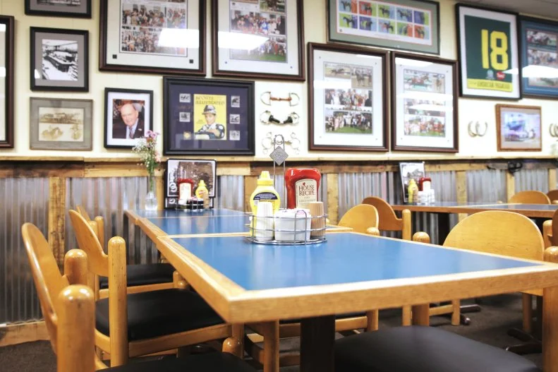Kentucky is synonymous with horse racing, even when it comes to diners. Louisville's Wagner's Pharmacy, located across the street from Churchill Downs (home of the Kentucky Derby), has long been a go-to for jockeys and racegoers. Leo Wagner founded it in 1922 after he purchased Hagen's Pharmacy; looking to expand his business, he sold horsemen cigarettes and weekly goods on credit and then started serving breakfast and lunch to a dedicated group of jockeys and trainers. In 1965, he bought Becker & Durski, a well-regarded supplier of turf goods and tack products, and Wagner's became a go-to spot for horsemen to eat, dress and outfit their stables. (There are even a few horse ties in the parking lot in case a horseman is really in a rush!) The Wagners sold the pharmacy entity in 2014, but the diner remains a staple not just for jockeys, trainers and racehorse owners, but for University of Louisville athletes, tourists and loyal regulars, too. There's loads to love on the homey Southern menu: Try pairing the locally famous vegetable soup with a fried bologna sandwich or Derby sandwich, a toasty honey-glazed ham and Swiss. If you happen to be in town during the Kentucky Derby, don't miss the Kentucky Hot Brown, an open-faced hot turkey sandwich topped with tomatoes and Mornay sauce.
