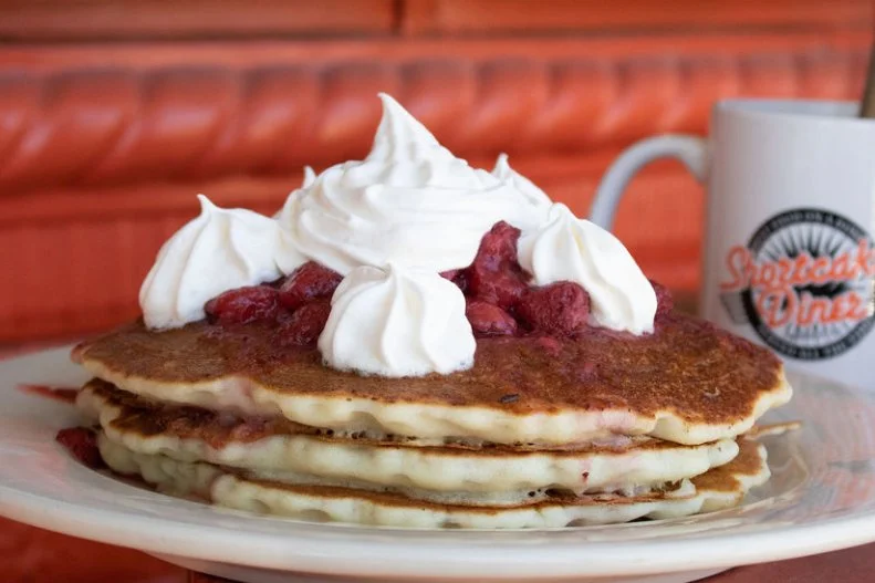 Glen and Gayla Higgins opened Shortcake's Diner in 1984, and it has remained a family-run restaurant in the heart of Stillwater. All six of their kids and even some of the grandkids have worked at the restaurant, and daughter (and current co-owner) Charley even remembers sleeping under one of the booths while her parents worked the crazy hours required to get a 24/7 diner up and running (they have since reduced the hours). The decor is minimal, but just about everything from the booths to the bar stools is bright orange, a nod to nearby Oklahoma State University's team colors. Scores of students and local regulars clamor for a taste of home cooking, especially hungry athletes. Former OSU and NBA basketball star Bryant "Big Country" Reeves used to order two Country Breakfasts at a time, for a hearty helping of eggs, breakfast meat and pancakes (or waffles or biscuits). Another fan favorite is the chicken-fried steak, featuring hand-breaded and fried cube steak from local meatpacking company Ralph's, paired with eggs at breakfast or on a sandwich anytime.