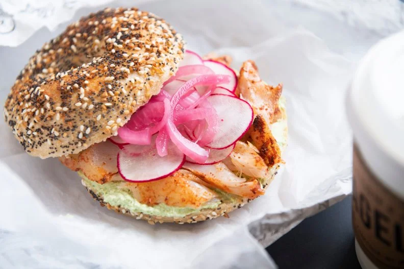 It’s tough to make a good bagel, especially if you’re attempting to serve said bagel with an Appalachian twist. But that’s just what Katie Button has done at her Button & Co. Bagels. Inspired by Asheville’s Appalachian bounty, the shop uses a combination of typical Northern flour with local Asheville-made Southern wheat flour, sorghum syrup and ramps for its bagels and spread. The shop still serves a good old-fashioned pastrami-on-rye bagel, classic house-made gravlax with all the fixings on an everything bagel and a sumac-rubbed smoked black cod with pickled red onion, radish and scallion cream cheese on a salt bagel.    