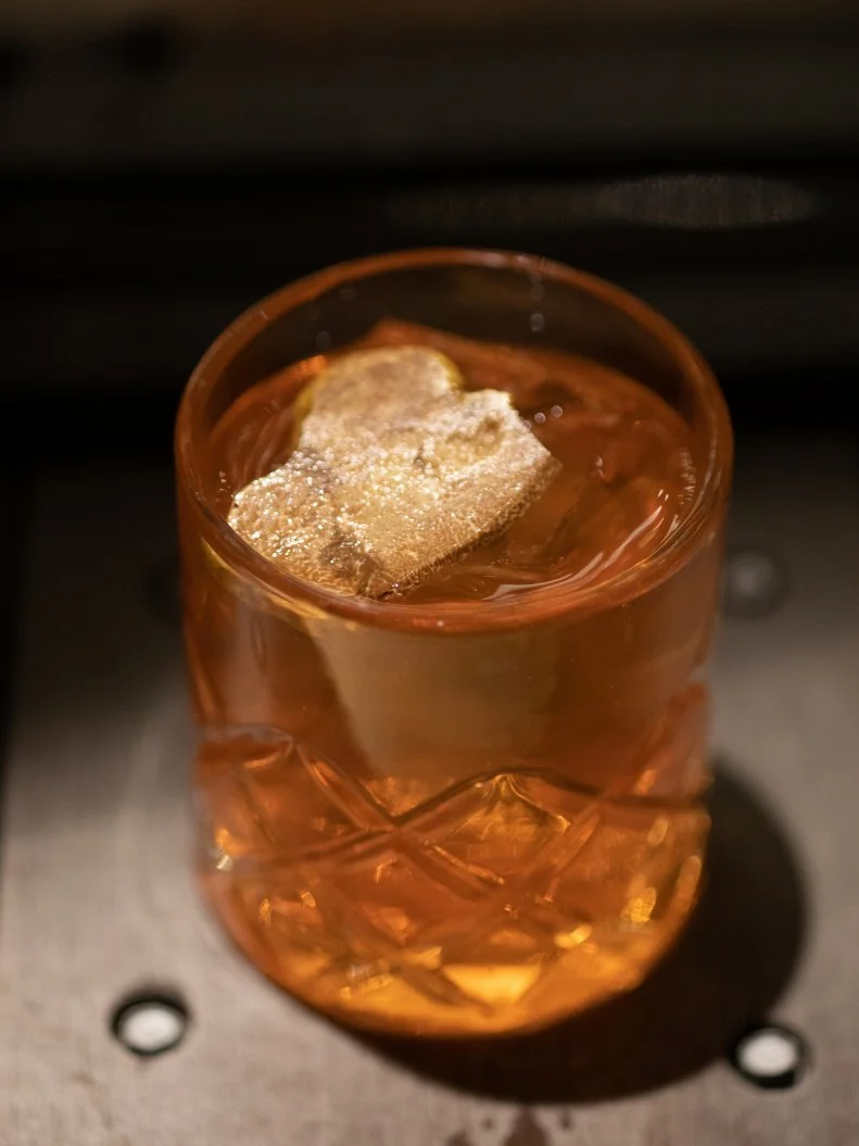 Truffles make everything more luxurious, even cocktails. This tequila-based cocktail is made with white-truffle-infused Aperol, Patrón Gran Platinum tequila and Carpano Antica vermouth. Each sip brings out bursts of citrus and umami. A shaving of white truffle on top doesn't hurt.