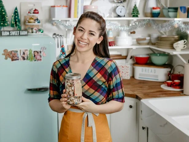 Host Molly Yeh, with her Gingerbread Snack Mix, as seen on Girl Meets Farm, Season 5.