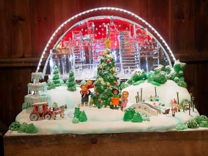 Competitors Vivian Pham and Sachiko Windbiel's Snow Globe display, as seen on Santa's Baking Blizzard, Season 1.