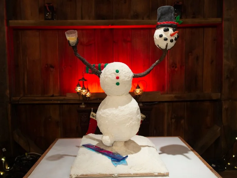 Competitors Emerlie Grandy and Kylie Holt's Snowed In inspired cake, as seen on Santa's Baking Blizzard, Season 1.
