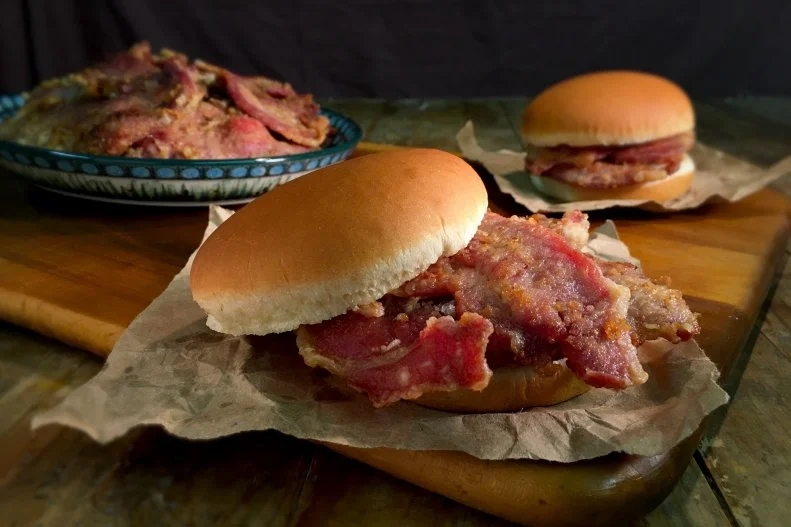 Ham and cheese is a U.S. classic, but in the South, it’s all about salty country ham. This grocery store built in 1949 cures its pork the old-fashioned way, according to a family tradition that dates back well over a half century. Each ham is hand-rubbed with a special blend of salt, brown sugar and saltpeter, then hung to cure only during the winter months, when the natural temperatures are just right. At least five months later — probably longer — the flavorful meat is sliced from the bone, soaked in hot tap water, dredged in flour, fried until golden brown and piled high on a hearty bun. While the shop is open throughout the week, its famous fried ham sandwiches are served only on Fridays, generally from February to November. So, it’s best to call ahead before making the trip.