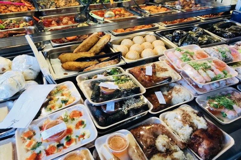 Set in the heart of Little Saigon, the International District of Seattle, this sandwich and takeaway shop offers Vietnamese-style deli specialties for a steal. Locals are obsessed with the flavorful banh mi sandwiches, crunchy baguettes filled with pickled vegetables and housemade ingredients ranging from grilled and BBQ pork to tofu and fried eggs. But what really makes this place great is that there are ample delicious options for those who want to abstain from bread — or just try something new. Every day the place lays out piles of hot food to go, including hearty portions of grilled pork with vermicelli noodles, lemongrass chicken with rice, spring rolls and more. We dare you to try walking out with just one thing to eat.