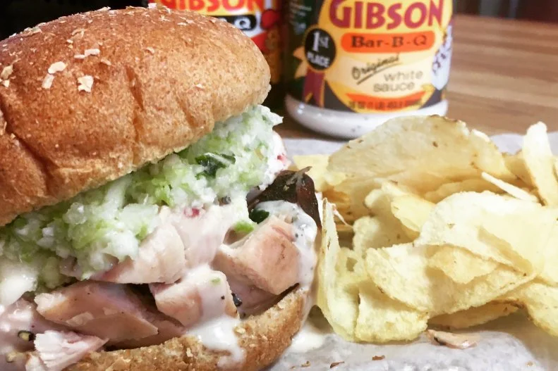 When most barbecue aficionados think of Alabama, they tend to conjure images of its barbecue chicken with white sauce. Invented at Big Bob Gibson in 1925, the North Alabama specialty features locally sourced birds, slowly cooked until tender and juicy in a hickory-fired brick pit, drizzled with the iconic tangy brew of mayo, vinegar and spice. The pairing is so good that it has since spread to neighboring restaurants in the area and has morphed into sandwich form. Those who want some bread to soak up the flavorful sauce — and don’t want to deal with bones — would be wise to try the pulled chicken with white sauce here at its birthplace. One bite and you’ll see why it’s been duplicated so many times.