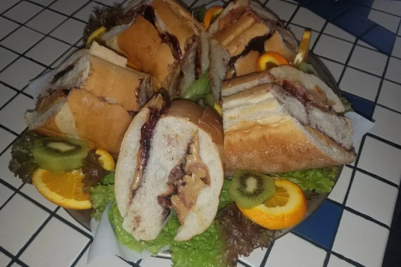 In 1976, Nick Andurlakis served Elvis and his friends an entire jar of creamy peanut butter, a jar of blueberry preserve and 450 grams of bacon inside a hollowed-out loaf of sourdough bread baked in the oven until golden brown at the Colorado Mining Company. The King — a well-known peanut butter fanatic — was so impressed that he later flew his private jet to Denver to buy 30 of the giant sandwiches for his pals, which they all polished off with several bottles of Champagne before flying back to Memphis. Andurlakis still makes that same sandwich for guests of Nick’s Cafe, his Golden, Colorado, restaurant.