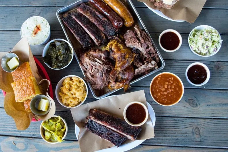 Raised in Compton, but with with a family tree full of Texas-based pitmasters that stretches back generations, Kevin Bludso decided to bring the art of slow-smoked meat to LA. And thanks to 10 TVs streaming local heroes like the Lakers, Clippers and Bruins, his bar has become a legit haven for athletic obsessives, as well as for lovers of beef ribs, brisket, collard greens, cornbread and peach crisp a la mode.