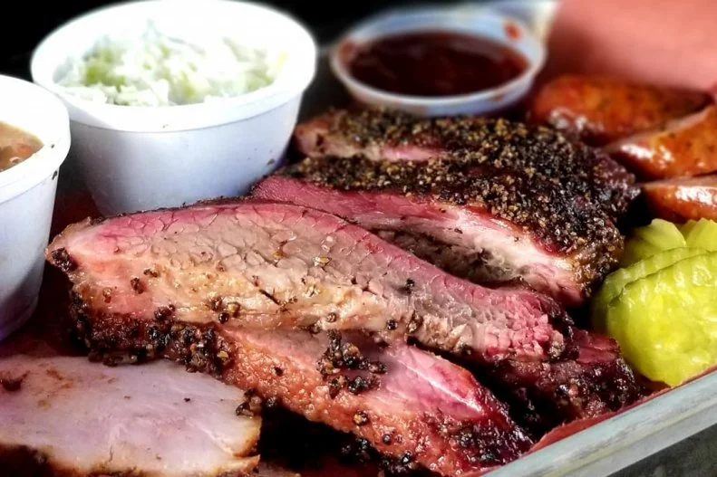 If you're hitting Dallas' 3.5 mile Katy Trail, don't bother to pack snack mix. Instead, schedule a rest stop at this rollicking ice house that boasts a 50-foot bar with 50 beers on tap, including numerous Texas drafts. There are even dueling menus, one devoted to real-deal, 18-hour smoked barbecue, and the other sporting Lone Star State-appropriate options like venison chili, breakfast tacos and sides of charro beans. After all, it's important for a bar to go big in a city like Dallas, a renowned hotbed of professional and collegiate teams.