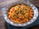 Host Rachel Ray's Pasta with Vodka Sauce and Shrimp, as seen on 30 Minute Meals, Season 28.