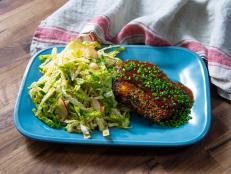 This is not your everyday pork cutlet. It's the thin and crispy fried pork you know, but with a shiso and savoy cabbage slaw and topped with a sweet and tangy sauce. You'll never look at your cutlets the same way again!