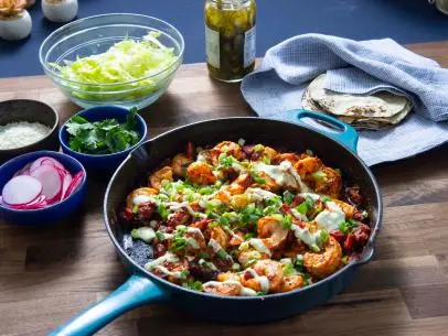 Host Rachel Ray's Mezcal Shrimp Tacos with Guac Crema, as seen on 30 Minute Meals, Season 28.
