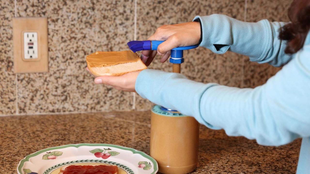 When running low on peanut butter, use a spatula to get the rest out.  Easier to scrap the sides and it doesn't get all over your hands! :  r/lifehacks