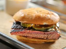 <p>This barbecue joint is making incredible sandwiches in a 90s, hip hop atmosphere. Here Guy finds the very first rib sandwich in the history of DDD. The McDowell is made with their deboned smoked ribs, their Soul-Glo sauce, pickles and onions. &ldquo;The angels in Flavortown are crying,&rdquo; said Guy.</p>