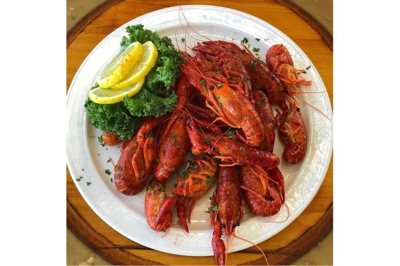 If the oceans, lakes and rivers surrounding South Carolina, North Carolina and Virginia seem lacking in marine life, thank local branches of Captain George's for that. The popularity of their boat-to-buffets has added up to 1.5 million pounds of crab legs, 265,000 pounds of shrimp, 250,000 pounds of scallops and 200,000 pounds of fish cooked each year. And that only accounts for four of over 70 items served.
