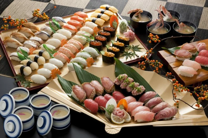 Will your stomach cry uncle first? Or will you succumb to writer's cramp after checking off boxes for hours, at New Jersey's string of Sushi Palaces? Armed with paper menus and pencils, guests can tick their way to unlimited quantities of red snapper sashimi, mushroom avocado maki, spicy tuna and specialty rolls like the Pink Lady, with salmon, tobiki and crab. And astoundingly, the $21.95 price doesn't apply just to sushi â   endless amounts of soup, salad, starters, teriyaki, tempura, noodles and even dessert can be had with a mere flick of the wrist.