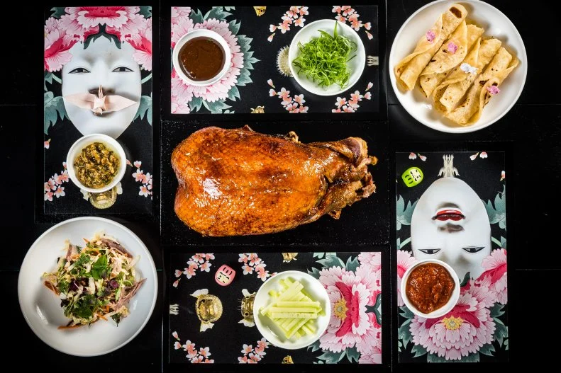 With three restaurants, two bars, a coffee shop and 24-hour room service, you can literally eat and drink around the clock at The Line Hotel DC. James Beard Award-winning chef Spike Gjerde is behind the brunch-and dinner restaurant, A Rake's Progress. The bounty of the Mid-Atlantic is on full-display here, so you're guaranteed a taste of the region no matter what you order, but the stone hearth centerpiece is your clue to order anything roasted or smoked, particularly small game such as rabbit, duck or quail. For an equally thoughtful and local approach to drinks, head to A Rake's Bar for fruit- and herb-based cocktails, communal punches and Maryland ciders on tap. Erik Bruner-Yang is behind the other two restaurants: Brothers and Sisters, a lobby restaurant and bar with shareable plates and snacks; and Spoken English, a standing-room restaurant and bar anchored by an open-flame oven that turns out dishes such as Peking duck, grilled yakitori and wagyu short rib. Don't miss desserts from acclaimed pastry chef Pichet Ong — the desserts are as delicious as they are striking, so it's no surprise to learn that Ong has a master's degree in architecture. Still hungry? The lively Adams Morgan neighborhood in which the hotel is located is chock-full of cafes, all-night diners and a variety of global restaurants, including Ethiopian, Salvadoran and Vietnamese spots.