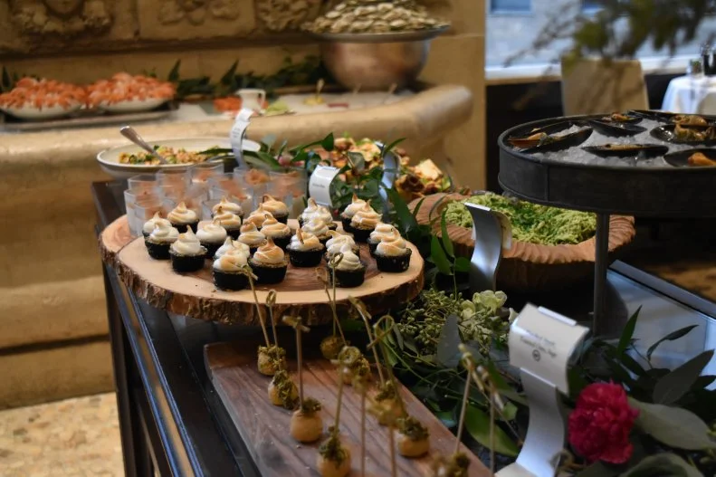 Any hotel that has 24-hour room service is a winner in our book. But The Rittenhouse, in Philadelphia's Rittenhouse Square, earns bonus points for unusual dishes like a dry-aged duck for two with dates, sunchokes and Madeira, and it'll be unveiling a special room-service menu for pets, too. Another in-room dining perk is the well-stocked minibars with local snacks such as housemade Philly pretzels. The lavish Sunday brunch at Lacroix, the hotel's signature restaurant, is the stuff of local legend. Executive Chef Jon Cichon sets up a spread that spans the entire restaurant with more than 50 dishes, from canapes like foie gras s'mores to a full raw bar with caviar. Walk it off with a stroll around Rittenhouse Square and a visit to the nearby Philadelphia Art Museum, then head back to the hotel for one of the city's best afternoon teas, in the Mary Cassatt Tea Room, named after Pennsylvania native and lauded Impressionist painter Mary Cassatt. The tea sandwiches, scones and seasonal sweets, such as green tea verrine — green tea-infused matcha sponge cake layered with white chocolate mousse and lychee gelee to look like an edible terrarium — are practically works of art themselves. Take home a tin of the hotel's namesake tea blend, featuring Ceylon bergamot, rose petals, cardamom and borage.