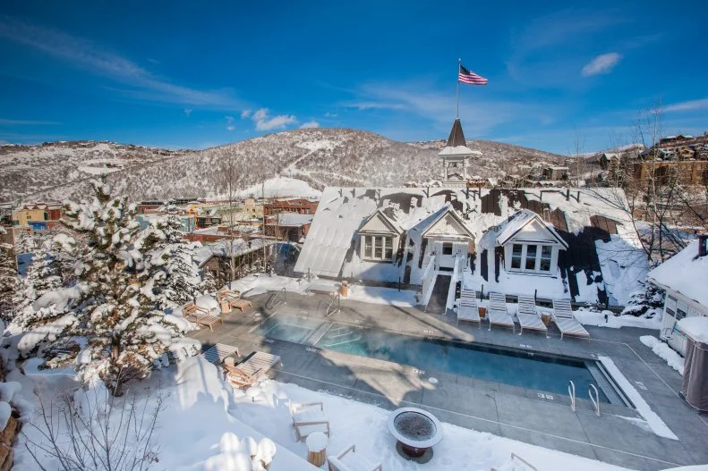 With its fresh powder and world-class slopes, Park City is a ski lovers' paradise, but the experience wouldn't be complete without apres-ski. At the historic Washington School House Hotel, take advantage of daily complimentary apres-ski service in the Living Room with charcuterie, cheese, and housemade desserts and pastries. Take things sweet by ordering the DIY s'mores kit, which is particularly enjoyable next to the outdoor poolside fireplace, which happens to be made from the steel torch from the 2002 Winter Olympics. The Living Room is also where you'll fuel up for the day ahead with a hearty ski breakfast (don't miss the fluffy pancakes). Traveling with tots? Ask for the secret kids' menu, which features favorites like grilled cheese and corn dogs, and during the holidays, look for a sugar cookie decorating workshop led by pastry chef Callie Mundy. If you're heading out for a day of snowshoeing or hiking, ask the kitchen to pack a backpack gourmet picnic lunch (complete with trail map), then hit up local hotspots such as Yuki Yama sushi, Riverhorse on Main, Handle and the iconic High West Distillery, all within walking distance from the hotel. All that fresh air means you'll probably be asleep as soon as your head hits the pillow, but not before you discover the housemade mini dessert left on your pillow during turndown service.