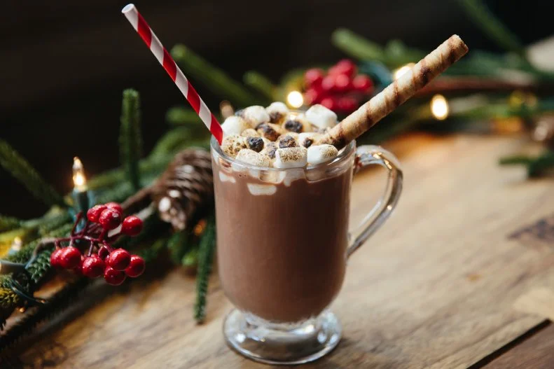 This spot may be in the middle of New York City, but it's channeling an apres-ski vibe — especially when it comes to warming drinks. A shot of rum and Luxardo Maraschino are added to the hot cocoa before marshmallows are placed on top and torched. The festive drink is finished with a Pirouette cookie.