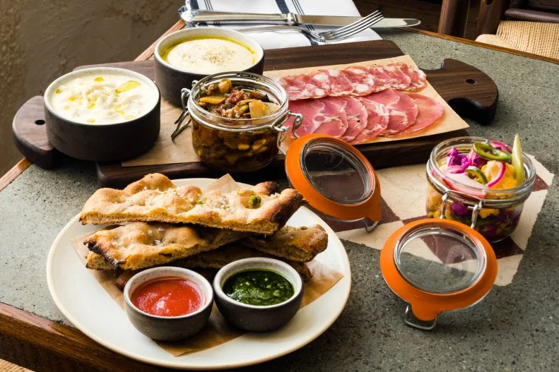 As longtime leader of the esteemed Rubirosa, Al Di Meglio already boasts serious pizza cred. But at his wood-fired Barano in Williamsburg, he's demonstrated facility with the entire Italian canon — composing glorious antipasto platters of house-baked farro sourdough, seasonal pickled giardiniera and stretchy stracciatella, along with pappardelle striped with squid ink and mounded with tuna belly bolognese, and meatballs made with 21-day dry-aged beef.