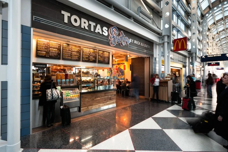 Ask any Chicagoan what their first stop is after landing at O'Hare and they're likely to name this Rick Bayless torta shop. For those passing through, it's a worthy detour for breakfast options like an egg-and-chorizo torta or lunch picks like the pepito with braised short rib or the mushroom and goat cheese option. As is typical of Bayless operations, all the meats and produce come from local farms — a fact proudly displayed on the menu.