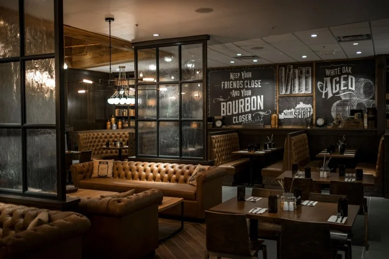 Even if traveling the Kentucky Bourbon Trail isn't in the cards, a stop at one of the official spots on it may be possible — right in the airport! In true Louisville style, this restaurant offers up over 85 different types of local bourbons and a chance to learn about the tasting notes and history of each. Southern cuisine like fried green tomato Benedict and crispy buttermilk fried chicken rounds out the menu, and vintage "library cards" offer up bourbon cocktail recipes that can be replicated at home.