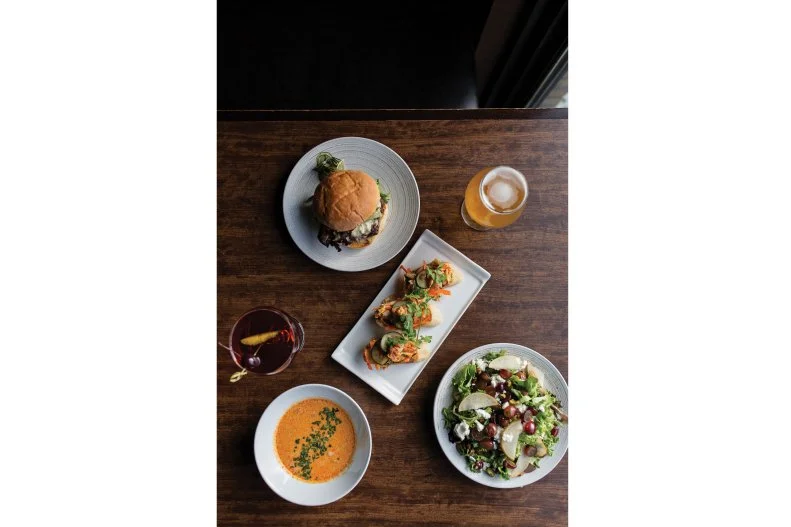 This locally owned and locally operated business (that's what "LoLo" stands for) can be found dishing out creative American food across Minneapolis, including at the airport. Grab a seat by the bar or at a surrounding high-top table to indulge in mixed-berry and Brie crostini drizzled with orange blossom honey or Korean BBQ hanger steak tacos with pickled cucumber, napa slaw and lemongrass aioli. A craft cocktail will help ease any weather delays.