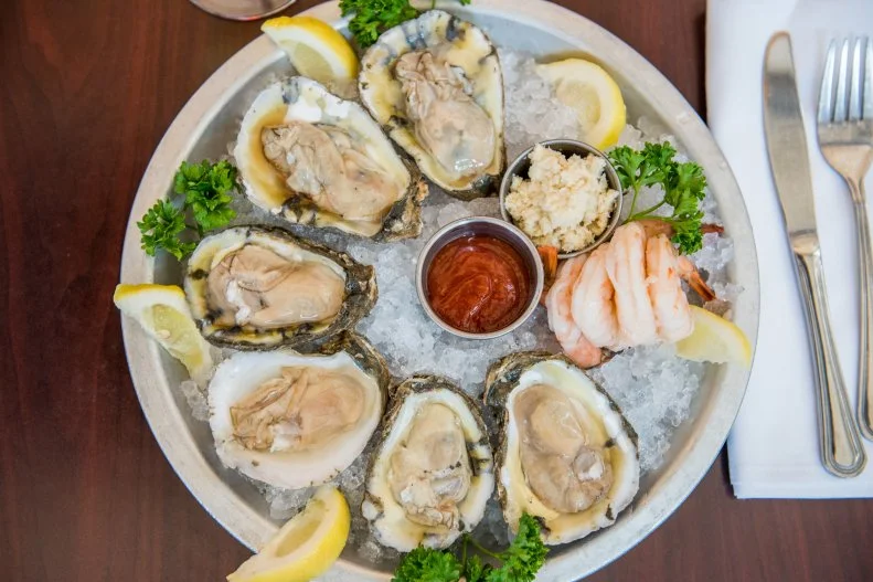 A stalwart in the Raleigh dining community, this oyster bar holds a lot of history. And although the downtown Raleigh location has a ton of character, with live music and a storied past, the RDU location still offers up the same fresh seafood, like East Coast oysters, shrimp cocktail and bacon-wrapped scallops. There's plenty of beer and wine on hand to wash it down, and breakfast is served for the early flightgoers.