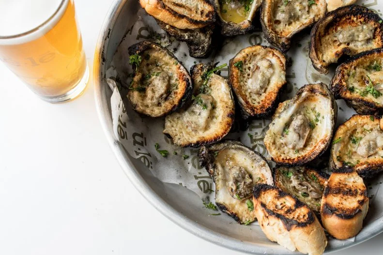 A favorite on the Tampa waterfront for its native Floridian food has made its way to the airport via a counter-service restaurant. Ingredients from the Gulf Coast, such as oysters and blue crab, are used whenever possible, and even the microbrews are made from local spring water. Many of the dishes pay homage to the native Timucua and Tocobaga Indians, early settlers of Florida. Save room for dessert — the ice cream is made on-site.