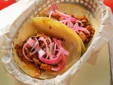 <p>Chef and owner Tony Avila and co-owner Axel Beverido have brought all the best bites from an authentic taco truck to a strip mall in Austin. Guy called their Taco Yucateco, with braised pork, black beans, pickled onions and bittersweet onions, the &ldquo;real deal.&rdquo;</p>