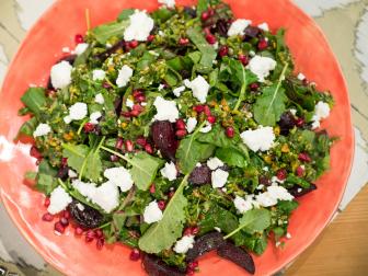 Katie Lee makes a Roasted Beet and Beet Green Salad with Warm Pistachio Salsa Verde, as seen on Food Network's The Kitchen