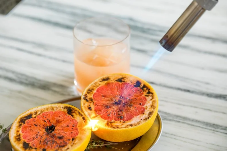 If you've ever wondered what it'd be like to have a drink with Dominique Ansel, wonder no more. At his palatial LA restaurant and bakery in The Grove, the Cronut creator brings his whimsical touch to classic cocktails such as margaritas and sazeracs. In a play on the brown derby, Ansel infuses whole California grapefruits with Eagle Rare Bourbon, brulees the fruit tableside, then juices it over ice. In true Ansel fashion, it's familiar flavors packaged in a novel way.