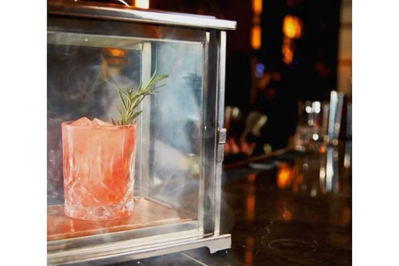 Beau Nash is billed as a champagne bar, but the bubbly isn't quite as head-turning as the Smoke & Rosemary. It starts like any other cocktail, as bartenders mix together tequila, Aperol and rosemary syrup, but the glass has one more destination before it hits your table: a bar-top smoker that imparts the scent of applewood chips. Once it emerges from the haze, it's ready for consumption.