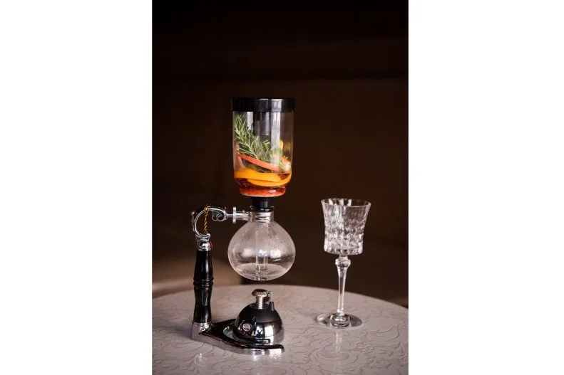 In a setup that resembles a science experiment, this bubbling siphon turns Campari sugar crystals, Bols Genever gin, citrus peel, rosemary and sage into a negroni base. As in the Italian apertif that inspired it, there's also vermouth â   but true to Grant Grill's complex delivery, the fortified wine comes in the form of a massive ice ball.