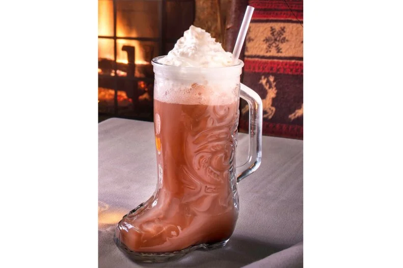 Sun Valley Resort ups the cozy factor by serving its boozy hot chocolate in a massive glass stocking. A simple, warming mix of peppermint schnapps, housemade hot cocoa and whipped cream, the off-menu sip is best enjoyed in front of a cozy fireplace.
