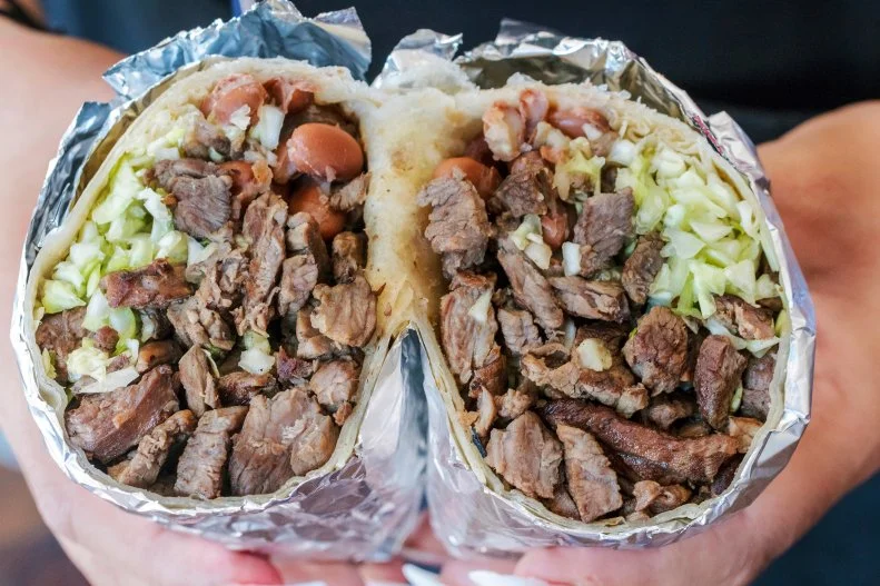 Not all carne asada is created equal. Factors varying from the wood type used for grilling, to the seasoning can have an effect on the taste of the thinly sliced, grilled and chopped steak. El Guello Canelo in West Phoenix gets it right — even the James Beard Foundation agrees, naming the restaurant an America’s Classic for its famous Sonoran hot dogs. The Very Mucho Burrito ($9.25) wraps their carne asada up in a huge flour tortilla with cheese, pinto beans and cabbage. Be sure to visit their salsa bar for all of the extra fixings. Add a guacamole tower, with enough dip for a crowd, for $7.25.