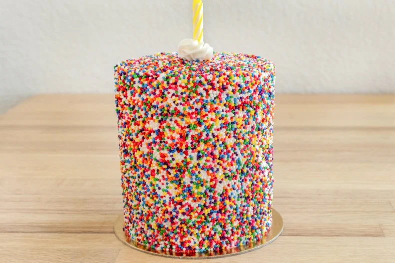 Want to throw a party for yourself, all by yourself? No problem! Only six inches wide and festive as can be, these happy little cakes covered in rainbow nonpareils are edible joy and only $8.50 at New Wave Market.